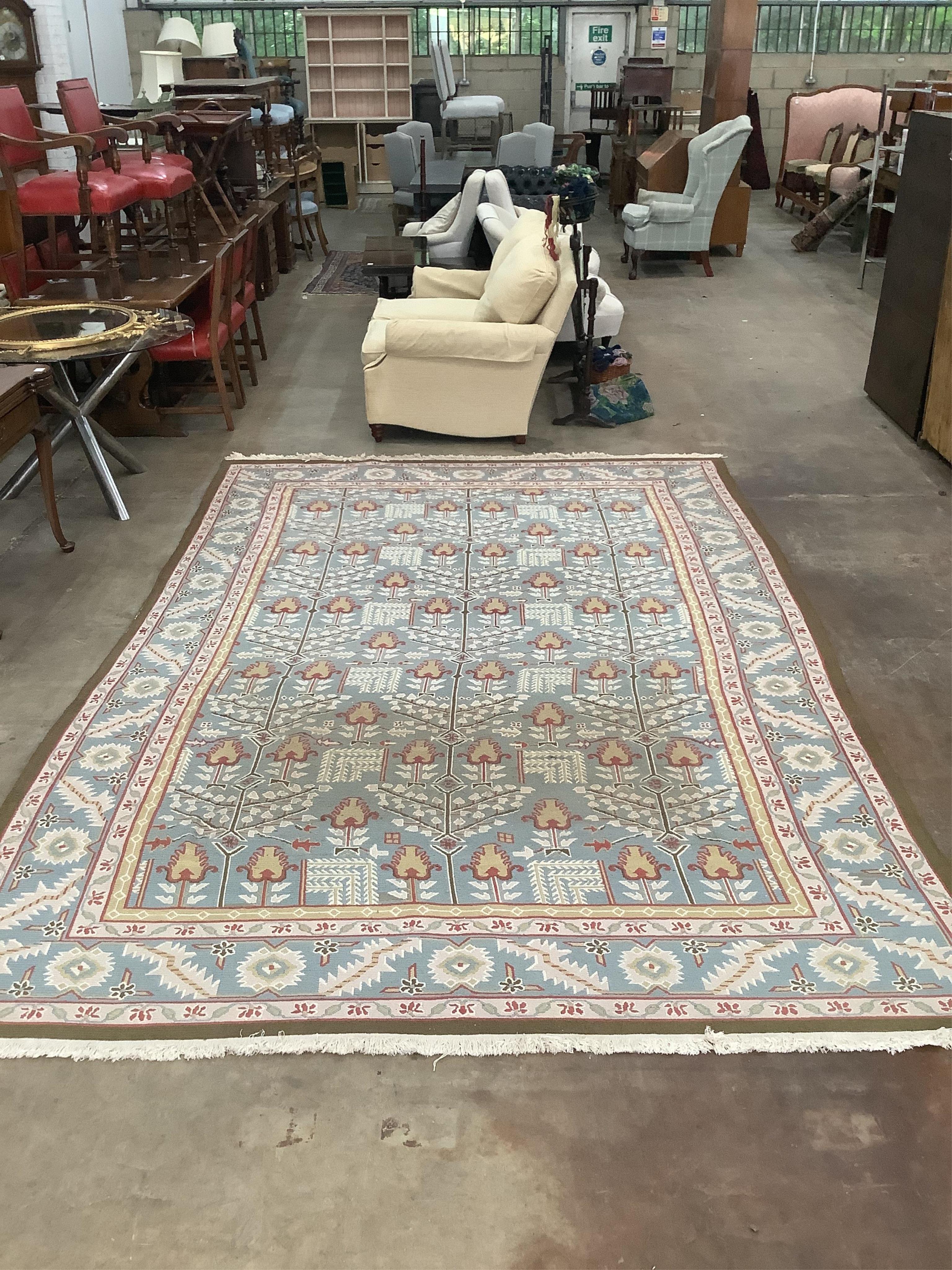 A modern Caucasian style pale blue ground carpet, 370 x 242cm. Condition - fair